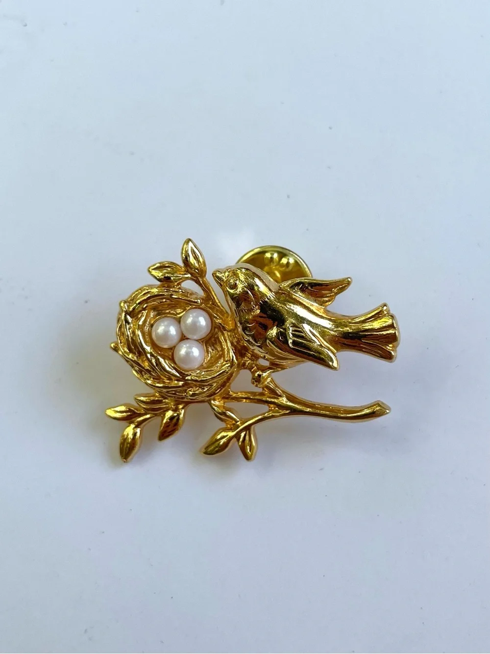 Avon Gold Tone Bird and Nest Brooch with Faux Pearl Accents